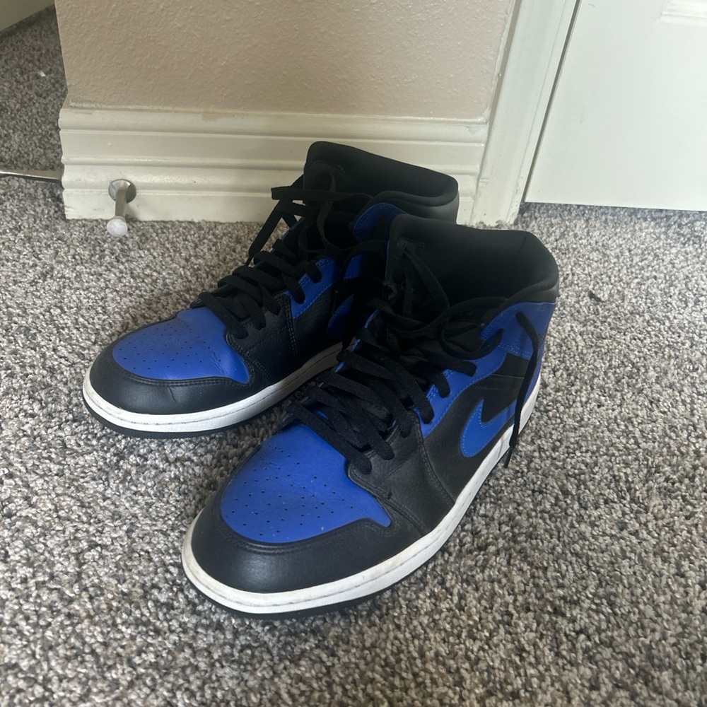 Jordan 1’s Black and Blue High-Top Sneakers
